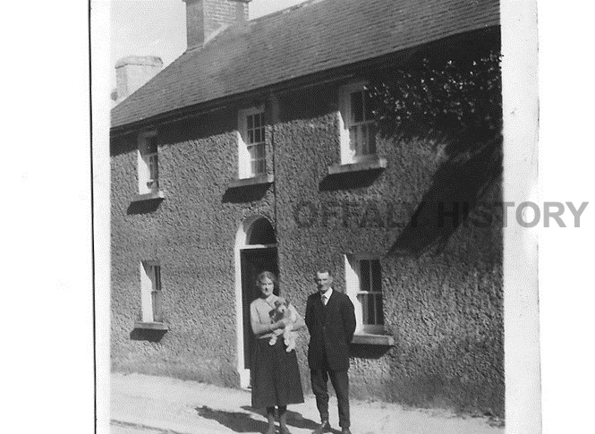 Aunt Poll and Uncle Bob outside their house on Kilbeggan Road, Clara